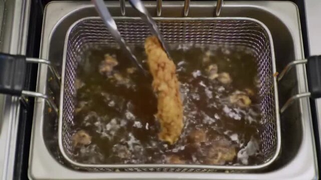 Crispy Chicken Zinger Fillet Frying in Deep Fryer