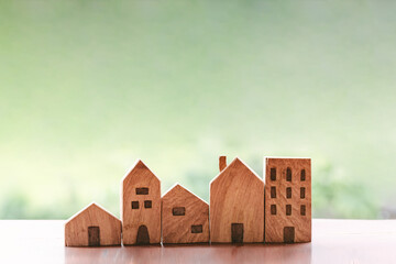 Wooden House Against Nature Hill Background, Housing Market and Real Estate Development Concept. Business Home Insurance and Property Investment for Future Concepts. House Equity Loan