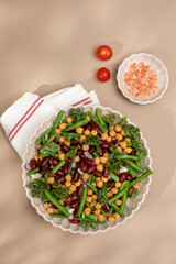 Healthy vegan salad with three types of beans. Salad with beans and chickpeas. Vegetarian menu 