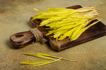 a microgrown corn, a bouquet on a cutting wooden board, no people,