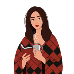 Young woman holding a book and cup of coffee in cozy blanket  