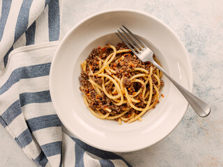 Spaghetti bolognese with minced meat or Makarony Po Flotski or Russian Navy Style Pasta. Top view....