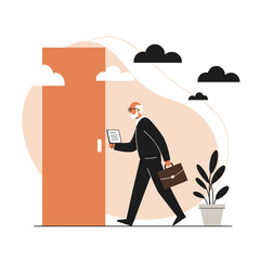 Businessman walking through door while holding a tablet and briefcase  
