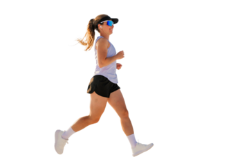 Running woman in athletic wear showcases determination and energy while enjoying 