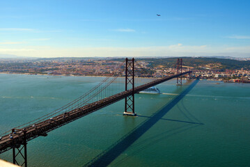 April 25th Bridge suspension bridge that crosses the Tagus River, connecting Lisbon with Almada,...