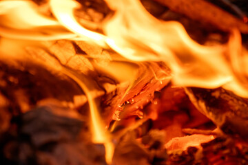 Red hot coals in a burning fire