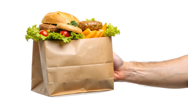 Hand holding a paper bag full of fast food including a burger, french fries, lettuce, and tomatoes, isolated on transparent background