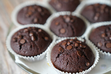 Fresh Homemade Chocolate Muffins close up product shot