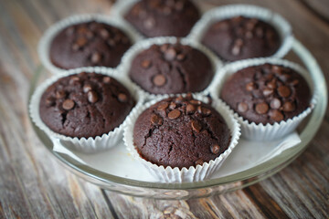 Fresh Homemade Chocolate Muffins close up product shot