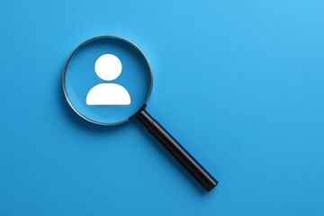 Magnifying glass highlighting user avatar on blue background illustrating concept of online presence, identity verification, digital search