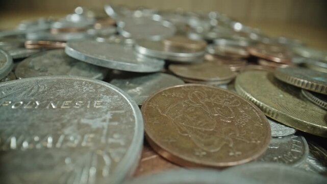 International Coins Captured in Shallow Focus for Travel Concept