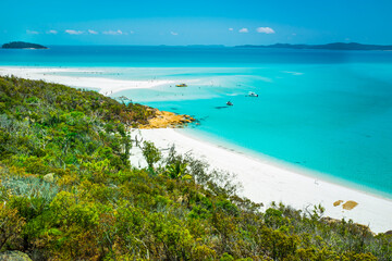 Whitehaven Beach is on Whitsunday Island. The beach is known for its crystal white silica sands and...