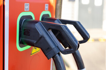 Detail of a cable of a public charging station for electric cars. Zero-emission car charger....