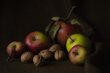The vibrant colors of the fruits apples, walnuts