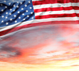 US flag in sunny sky