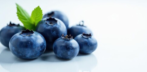 Fototapeta premium Close-up of plump, juicy blueberries on pristine white , organic, berry, sweet
