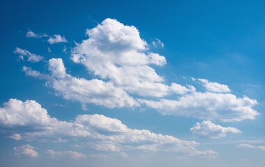 A view of a blue sky with some clouds