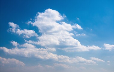 Obraz premium A view of a blue sky with some clouds