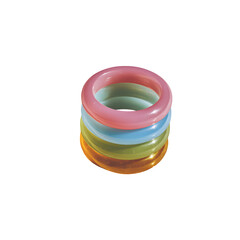 Stack of Pastel Glowing Rings on Marble Surface