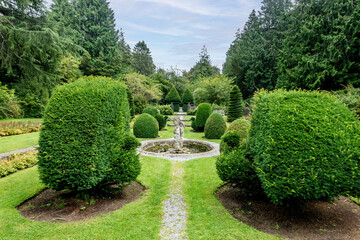 Sunken Garden at Farmleigh, Phoenix Park, Dublin. Formal landscape with clipped yews, gravel paths,...