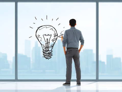 businessman writing idea on transparent glass board - Powered by Adobe