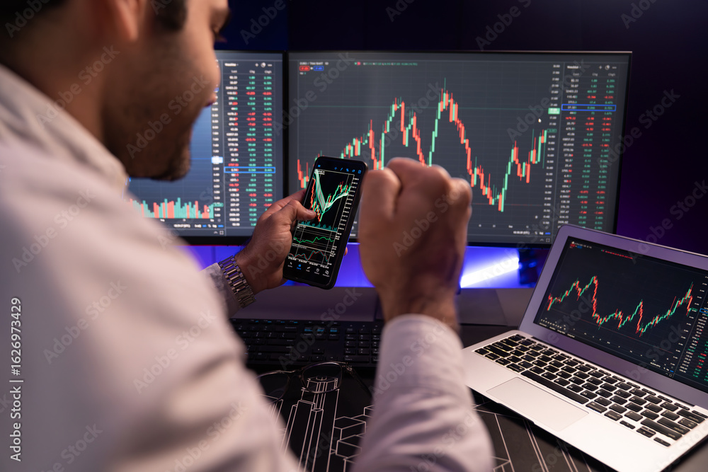 Poster smart trader businessman concentrating on dynamic stock exchange investment on pc and laptop showing