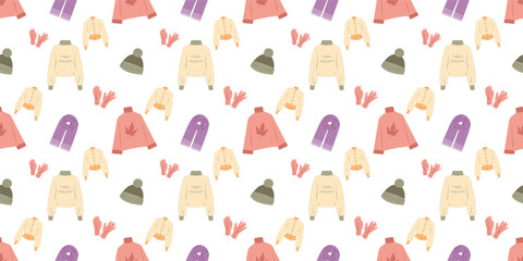 Fall clothing seamless pattern with jumpers, sweaters, cap, scarves and gloves in flat design. Autumn vector illustration for creative marketing materials