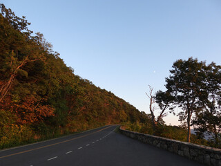 Visitors can enjoy an evening ride along skyline drive, at sunset. Shenandoah National Forest, Virginia.     