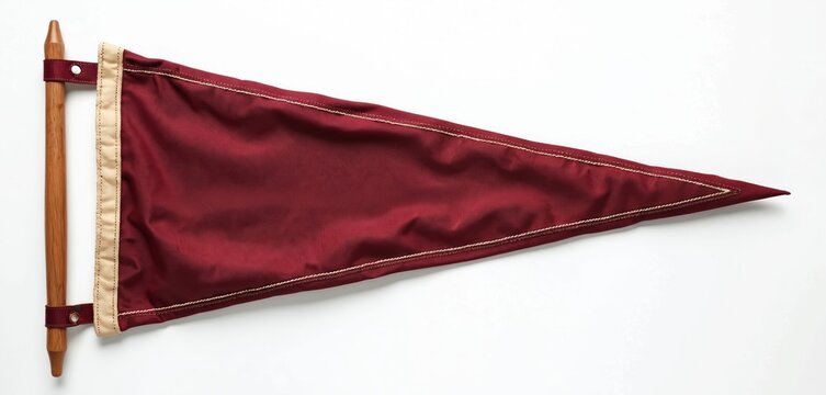 Vintage style college pennant crafted from deep red fabric with contrasting beige trim, stitching. Mounted on wooden pole, blank flag serves as versatile template for branding, school pride, retro