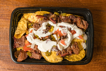 Nachos topped with brisket