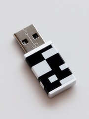 Compact Black and Silver Flash Drive on White Isolated Background