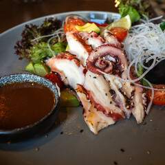 Grilled Octopus Salad with Fresh Vegetables and Dipping Sauce
