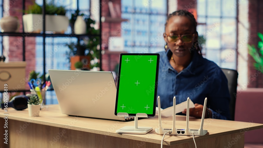 Poster black girl tries to fix an wi fi error by rebooting router next to isolated screen, troubleshooting 