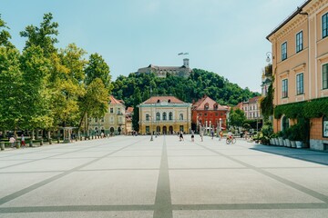 Ljubljana city square with castle view on a sunny day.