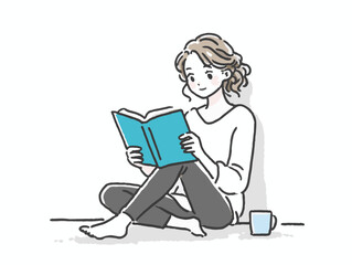 Reading young woman with soft curly hair sitting cross-legged, enjoying a book in a cozy indoor space, concept of relaxation and wellness