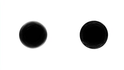 Two black circles on white background, textured