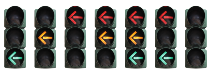 Set of isolated traffic lights for left turn with different color combinations.