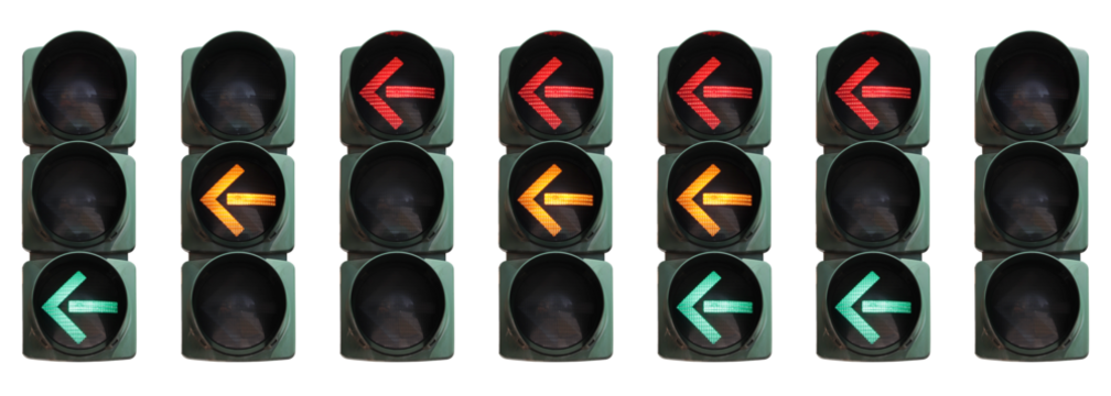 Set of isolated traffic lights for left turn with different color combinations.