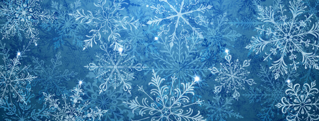 A vibrant Christmas illustration featuring large intricate snowflakes in various designs, layered with depth, interspersed with bright sparkles, in blue tones.