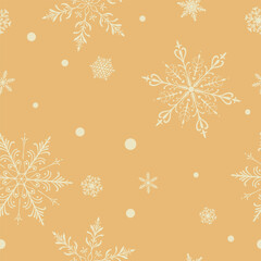 Christmas seamless pattern with big and small intricate snowflakes in various designs and small circles, white on beige background.