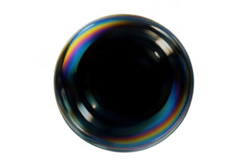 Soap bubble with iridescent surface creating colorful reflections on transparent background