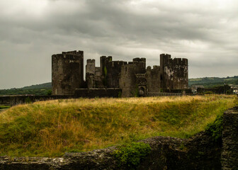 A view of a castle under a cloudy sky.
