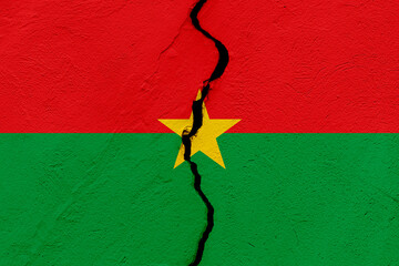 The flag of Burkina Faso into a grunge cracked wall