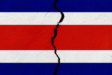 The flag of the Republic of Costa Rica into a grunge cracked wall