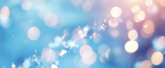 Obraz premium Abstract bokeh lights in pastel blue and peach tones