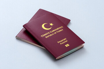 New Turkish citizen public passports on the blue background.