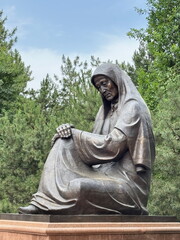 Statue of Crying Mother in front of the eternal fire in Tashkent, Uzbekistan 
