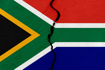 The flag of the Republic of South Africa into a grunge cracked wall