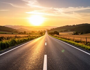 Fototapeta premium Empty Road Stretching Into Sunset Landscape