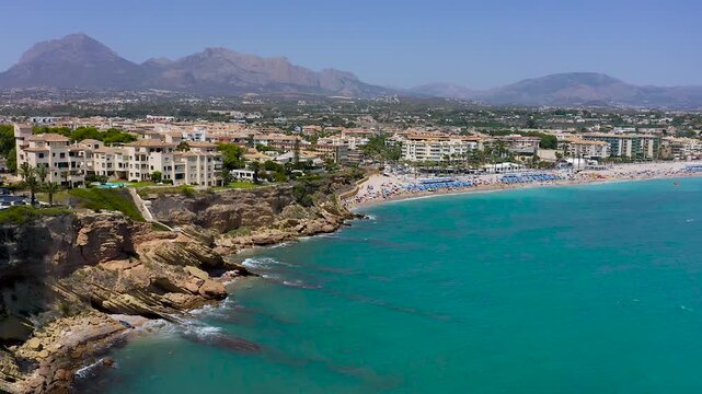 Aerial view of the spectacular sand beach of El Albir, with turquoise waters in the Mediterranean Spanish province of Alicante.